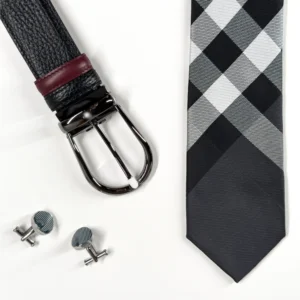 Men's accessories gift set with grey tie, black belt with gunk-metal buckle and silver cufflink