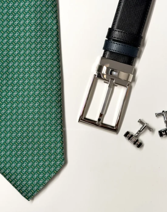 Men's accessories gift set with green tie, black belt and cufflinks